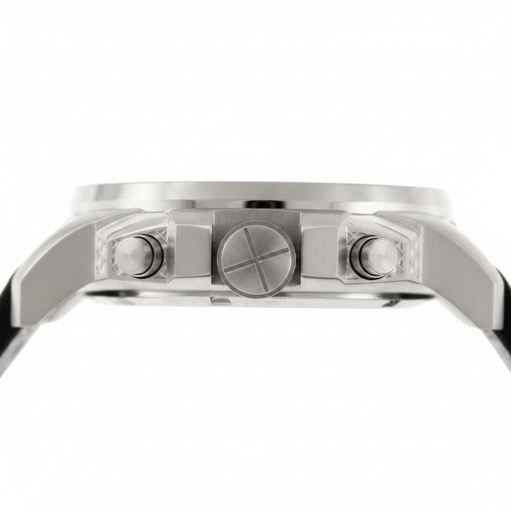 Close-up of a silver-toned metal watch case showing the side buttons and crown, with a black strap visible against a white background.