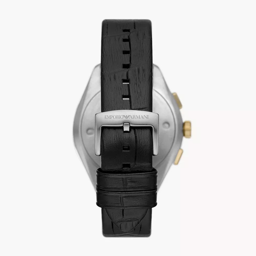 Black watch with silver case and gold accents on a white background