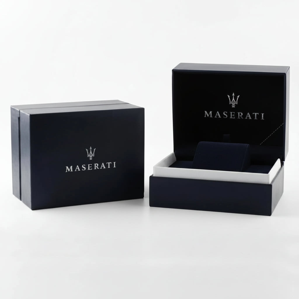 Two Maserati branded presentation boxes on a clean white studio background, with one closed box and one open box showing a dark interior.