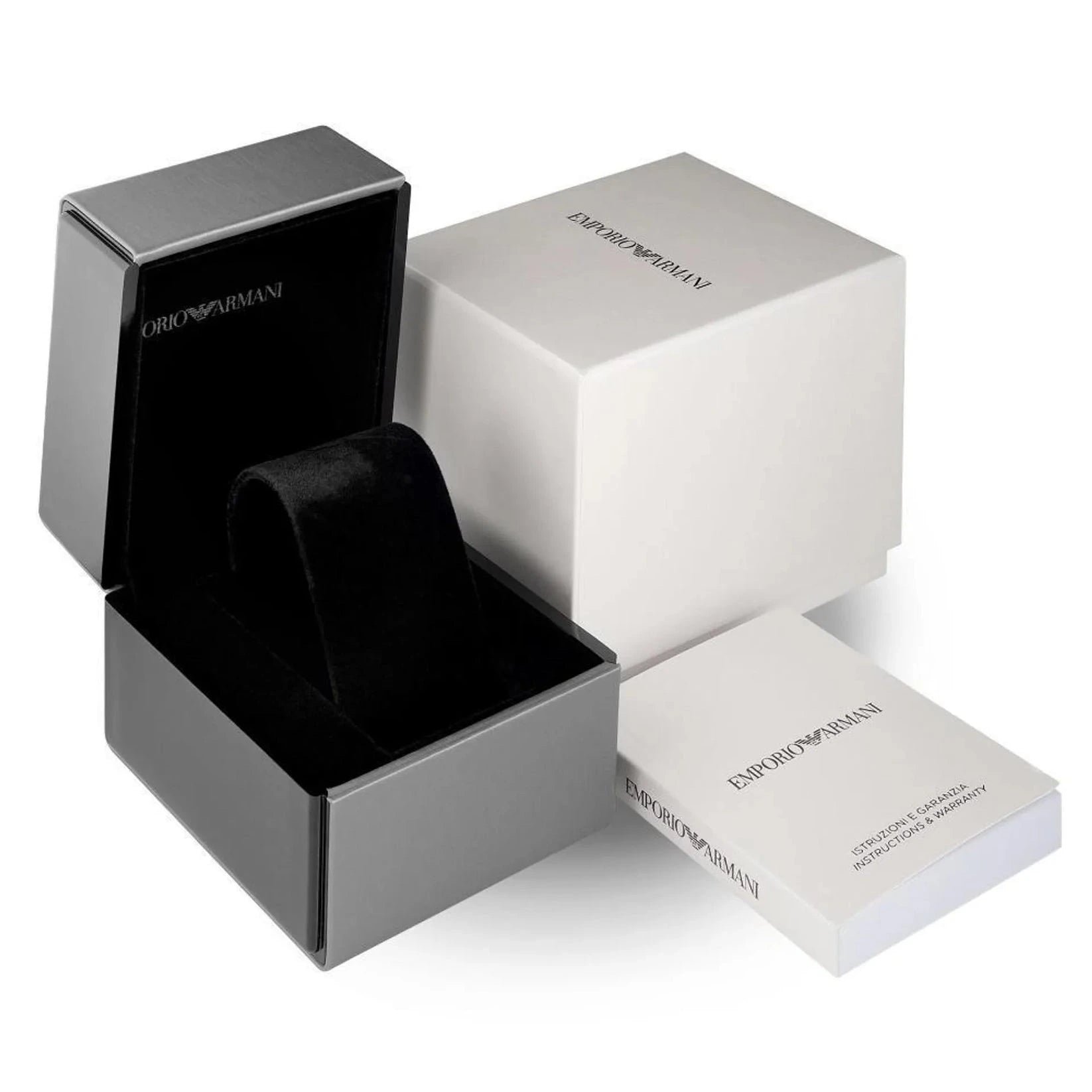 Armani Privé luxury watch packaging set, featuring an open dark gray watch box with a black velvet interior, a closed white outer box, and a white booklet on a white background.