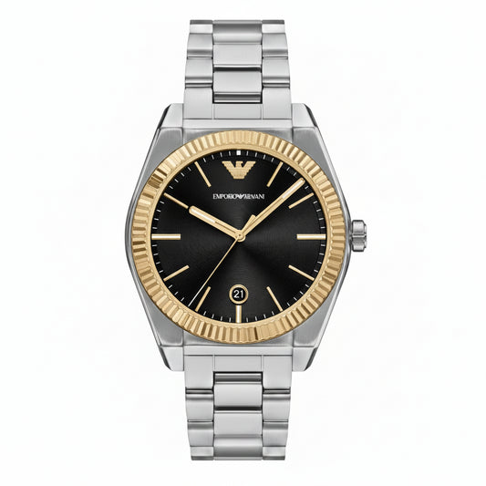 Armani Exchange men's watch with a silver stainless steel case and bracelet, a black dial, and a gold-tone fluted bezel. The image also shows a separate black alligator-texture leather strap on a light gray background.